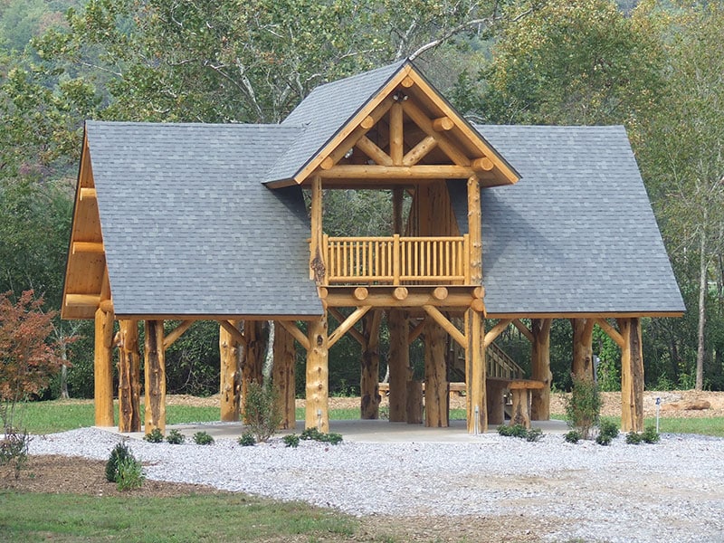View of finished log timber pavilion facing the upper balcony.