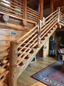 Stunning interior stairway made entirely of timber, built by the experts at Tip Top Construction.